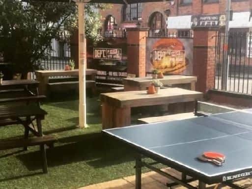 Laid back vibes outside at the Department of Meat & Social Affairs in Bridge Street featuring a table tennis table