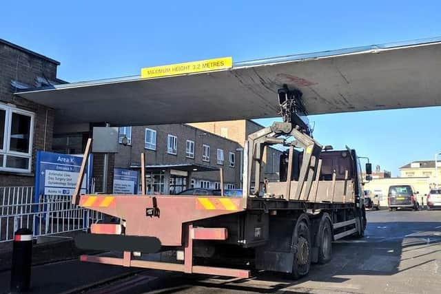 At 3.2 metres tall, the awning was too short for the lorry to fit under.