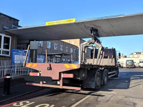 At 3.2 metres tall, the awning was too short for the lorry to fit under.