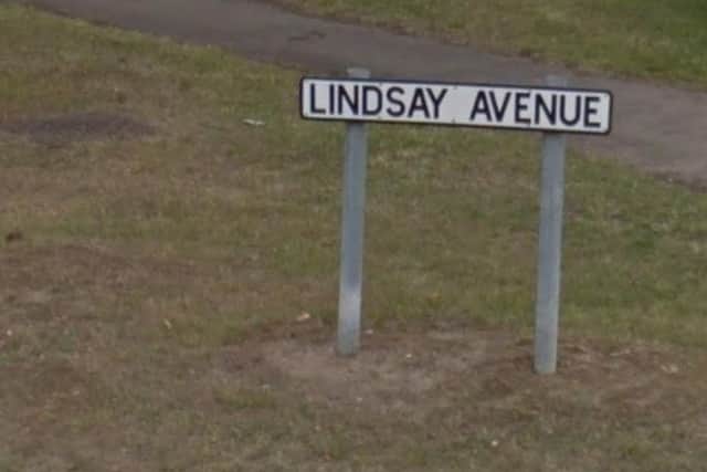 A woman came home to find three intruders burgling her home.