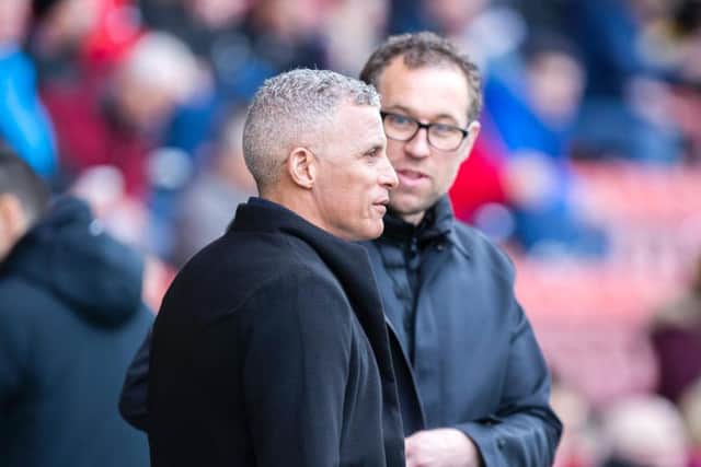 Keith Curle with opposite number Dave Artell before kick-off on Saturday. Picture: Kirsty Edmonds