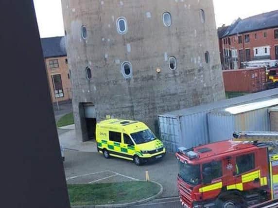 A man - reportedly a worker - fell 15ft from inside the tower.
