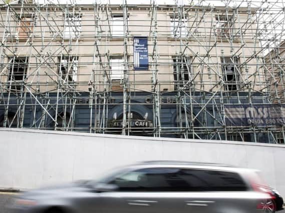 Old Northampton Group has vowed to take down the unsightly scaffolding outside the former Fat Cats within six weeks if it gets planning approval for a hotel there.