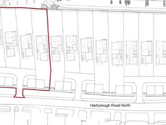 The 14 homes would be served by three access points onto the Harborough Road.