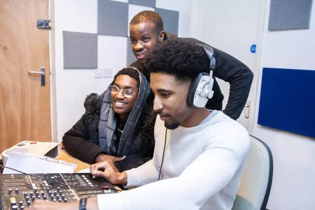 Jacob Collins-Brown, pictured with rising rapper Yxng Ragzy and Lewis Manning-Nurse at the recording studio in Springs Family Centre. The studio has been partially funded by NCF.