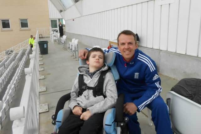 Lewis pictured with former England cricketer, Graeme Swann who was born in Northampton and went on to attend Sponne School in Towcester.