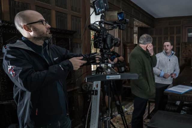 This picture shows the crew filming behind the scenes at Abington Park Museum. They were taken with the exhibits and it's old manor house feel.