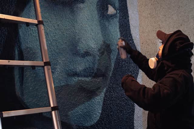 One of the many street artist commissioned to transform the underpass. Credit to Khandie Photography.