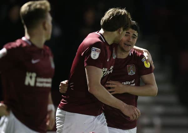 SWEET STRIKE: Joe Powell's stunning volley snatched victory for the Cobblers against Newport on Tuesday. Pictures: Pete Norton/Getty Images