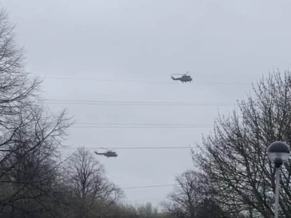 Military helicopters were seen swooping over Northampton yesterday before landing near Barnes Meadow.