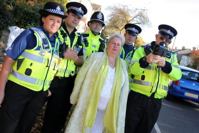 Councillor Jane Hollis, pictured with police officers in 2008 during her time in office