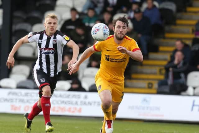 John-Joe O'Toole in a battle for the ball.