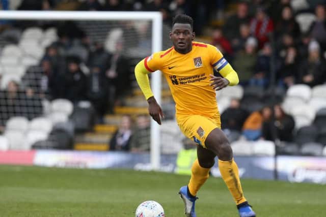 Towering and dominant at the heart of defence. Barely broke sweat in dealing with Grimsby's ineffective forward line. Played the conditions well too and slashed a late half chance wide... 8