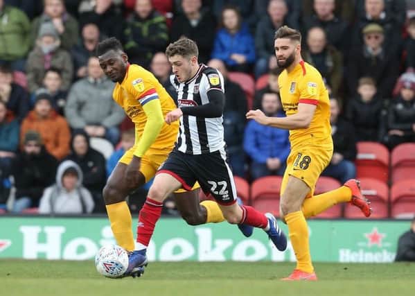 Jordan Turnbull and Aaron Pierre were central to another solid defensive showing from the Cobblers as Grimsby struggled to create many opportunities. Pictures: Pete Norton/Getty Images