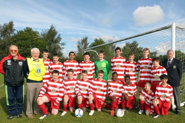 Mr Lee (left) is the club secretary for Thorplands Club 81, as well as occasional goalkeeper for the Saturday side