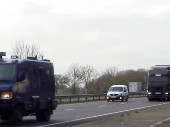 A nuclear convoy was spotted heading through the Northamptonshire area on Tuesday. Picture shows one of the warhead-carrying lorries near the Milton interchange roundabout, Didcot. Photo courtesy of Nukewatch.