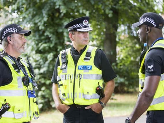 Nick Adderley (centre) says officers can still respond to incidents during meal breaks