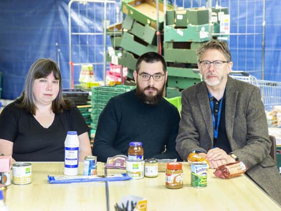 From l-r: Weston Favell Centre Food Bank manager Jo Alderman, rector of Emmanuel Church Haydon Spencely and CEO of Northampton Hope Centre Robin Burgess pictured appealing for food donations for their services to feed some of the town's poorest residents.