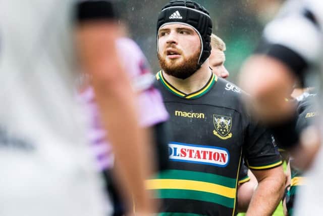 Karl Garside has put pen to paper on a Saints contract