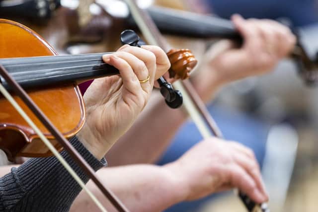 Felicity Harrison, first violin, learned how to play the violin in her sixties and is now one of the longest standing members.
Pictures by Kirsty Edmonds.