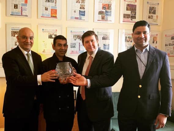 From left: Keith Vaz, Abdul Hye, Andrew Lewer and Naz Islam celebrate the return of the coveted Tiffin Cup at Saffron.