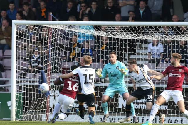 Aaron Pierre goes for goal against Port Vale