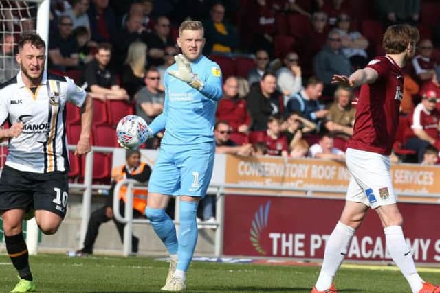 Unfortunate to see Vale's two goals squirm through his body despite getting a healthy touch to both. Not properly tested otherwise, though too many kicks flew out of play... 6