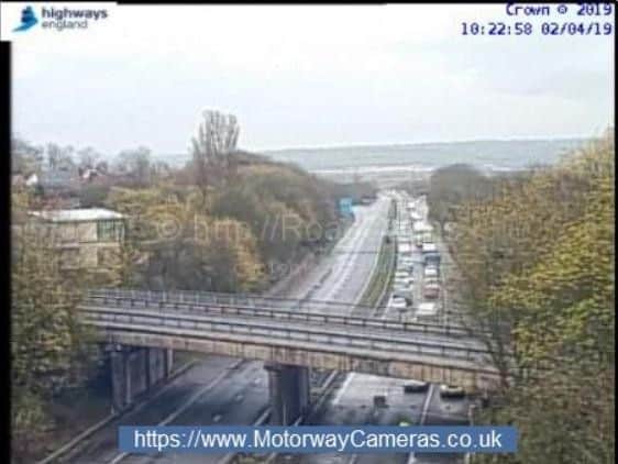Drivers stranded at the scene of the bridge strike on the M45. Pic via Highways England / www.motorwaycameras.co.uk