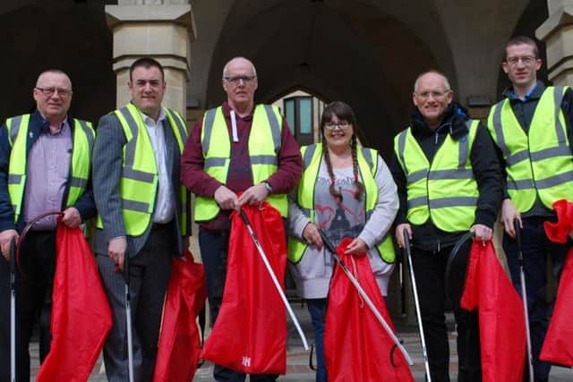 From left, Veolia's Keith Powell, cabinet member for environment Mike Hallam, Ecton Brook Street Champions Sally and Danny Jordan, Terry Richards of Duston and Richard Mallinson of East Hunsbury.