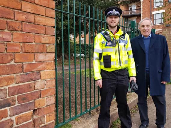 PCSO James Wetherall and councillor Les Marriott have been the driving force behind getting the fence installed.