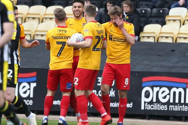 All smiles! Daniel Powell brought the Cobblers level at the end of the first-half. Pictures: Pete Norton