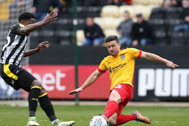 Was regularly Town's free man on the left when they created an overlap against 10 men but couldn't make the most of it. His services at the other end were hardly ever called upon... 6