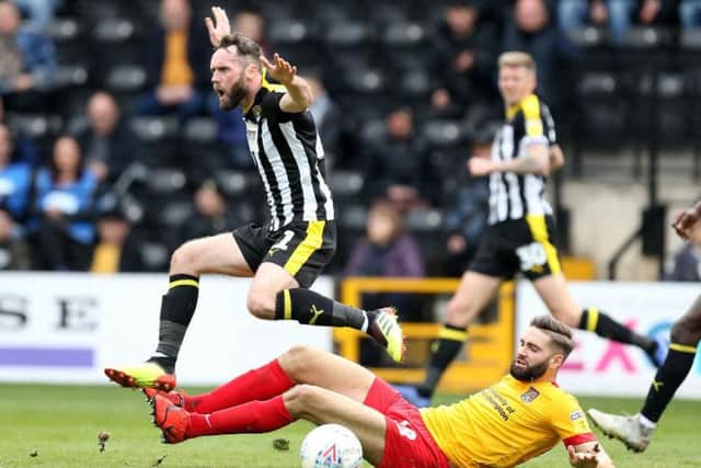 Full of action and tackles on his return to the side, including one superb challenge to disrupt a counter. Replaced early in the second-half as Cobblers went on the attack... 6
