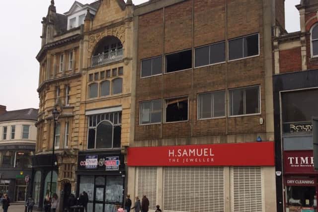 H Samuel jewellers in the Drapery remains closed today after a fire on the second floor of the building.