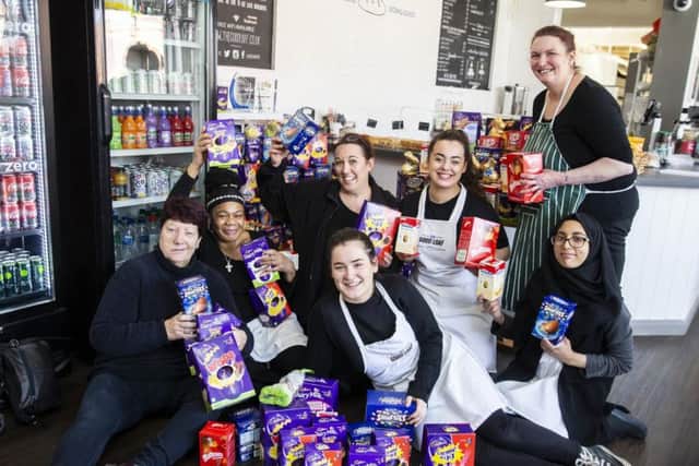 Jeanette Walsh, left and the Good Loaf team among some 500 eggs that you donated to our Easter appeal.