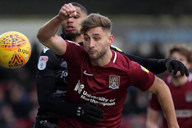 Returned to his more familiar role at centre-half as Curle went with a back three and defended well up against Mansfield's front men, bar one mix-up with his skipper... 7