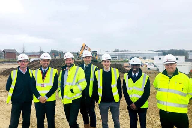 Kingsley Healthcare Group chief investment officer Muj Malik, second left, and investment analyst Leslie Amanquah, second right, with the care home developers on site in Brackley. Photo: Kingsley Healthcare Group