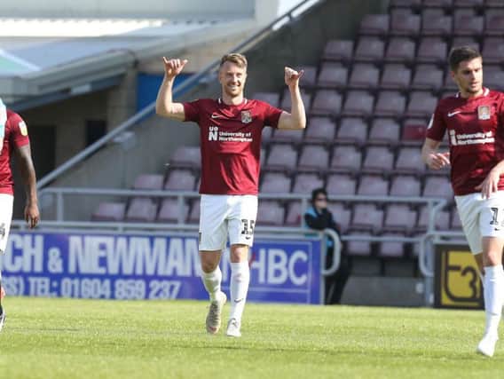 COOL FINISH: Dean Bowditch's excellent volley gave the Cobblers a first-half lead on Friday. Pictures: Pete Norton