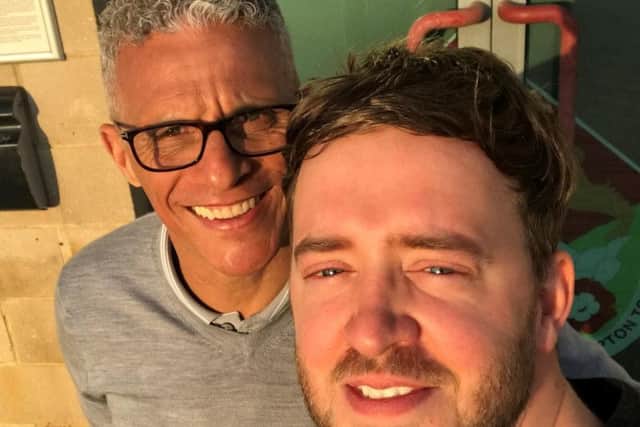 Northampton Town manager Keith Curle with supporter Matt Sellwood after they found Matt's watch