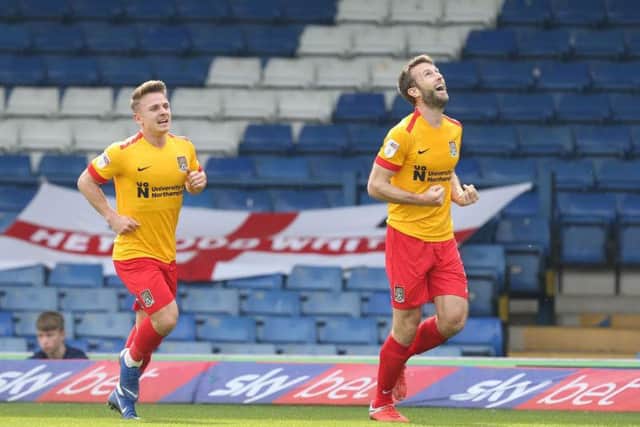 Andy Williams celebrates his 10th goal of the campaign