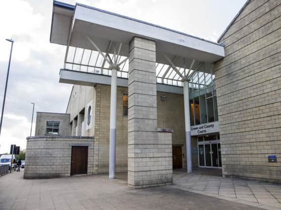 An 18-year-old drug dealer claimed in court he was forced into crime for fear of "being shot".