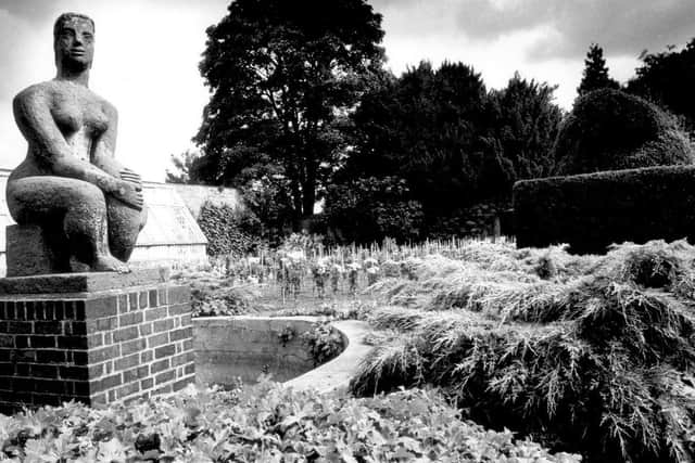 Seated woman with a fish, which originally had water coming out of its mouth. First exhibited at the second Battersea Park Sculpture Exhibition, in 1951.