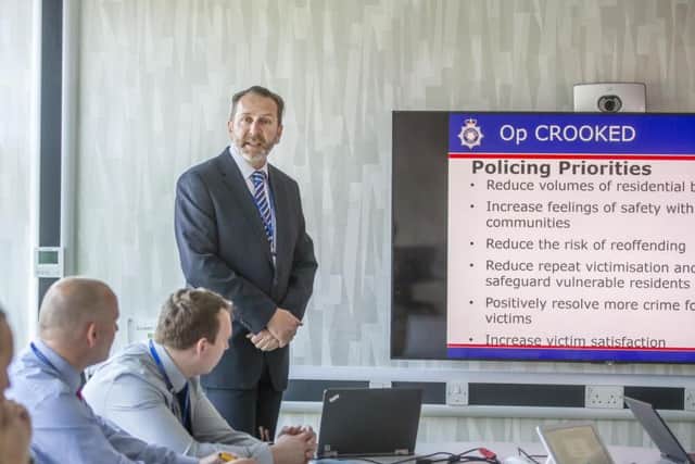 DCI rogers hosts one of the burglary team's morning meetings.