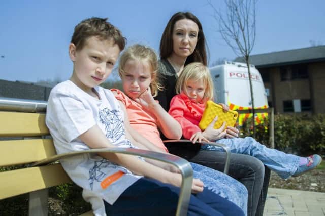 Laura Baker and her three children, Louis, Maisy and Eloise were thrilled to see their items returned after a raid in March.