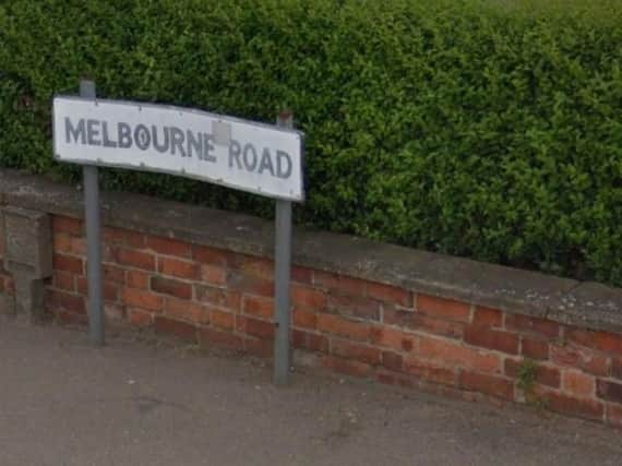 An 81-year-old woman was pushed to the floor and robbed in Melbourne Road, Northampton.