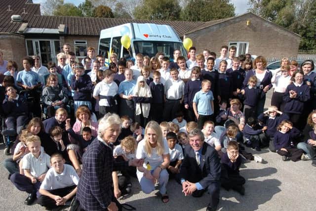 Mrs Tice presents the keys for a new minibus to the children of Heltwate School Variety Club, Peterborough.