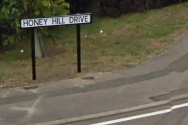 An off-duty policewoman in Honey Hill Drive was woken up to find a stand-off with knives on her doorstep.