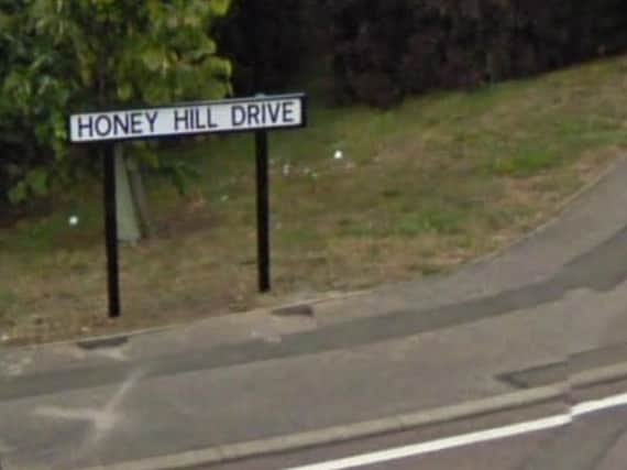 An off-duty policewoman in Honey Hill Drive was woken up to find a stand-off with knives on her doorstep.
