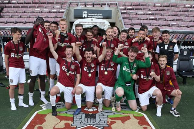 The Cobblers Football & Education A team celebrate their title success at the PTS Academy Stadium on Wednesday (Picture: Pete Norton)
