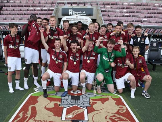 The Cobblers Football & Education A team celebrate their title success at the PTS Academy Stadium on Wednesday (Picture: Pete Norton)